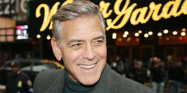 George Clooney performs onstage as Edward R. Murrow in Broadway’s Good Night, and Good Luck during live CNN broadcast