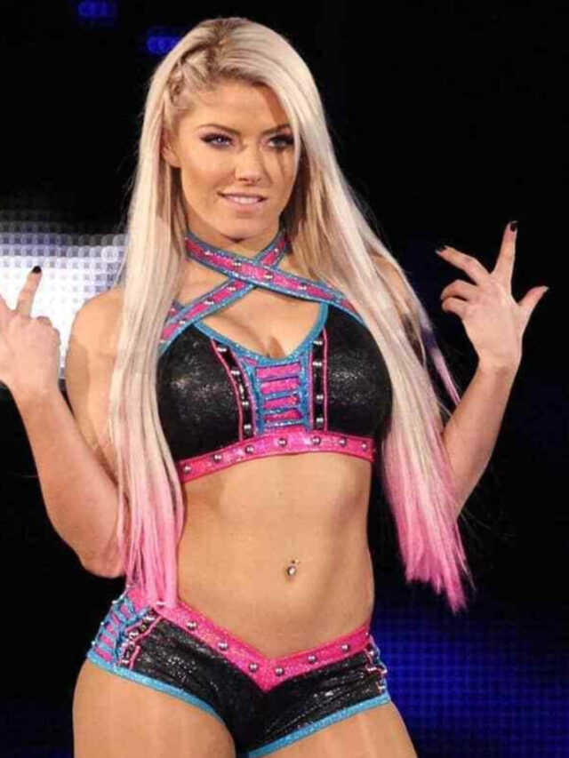 Alexa Bliss celebrates her victory during her WWE SmackDown return match.