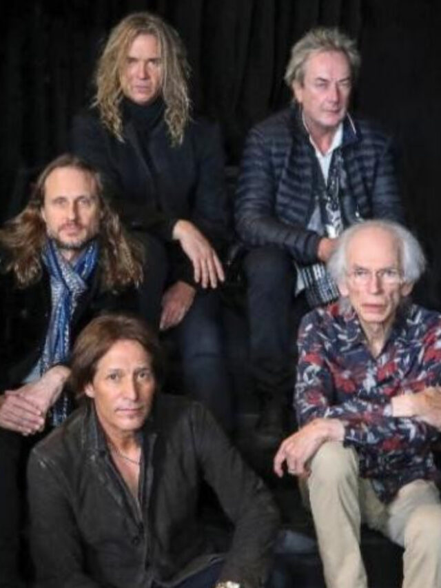 Yes band members playing instruments during a live performance on their 2025 U.S. tour