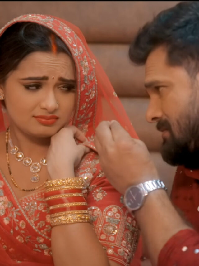 Khesari Lal Yadav dancing with co-star in Raat Bhar Mein music video with vibrant lighting and modern outfits.